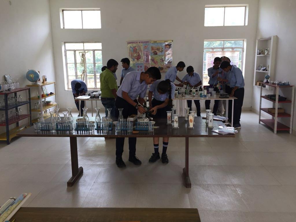Royal Academy Alwar middle school students in the science lab
